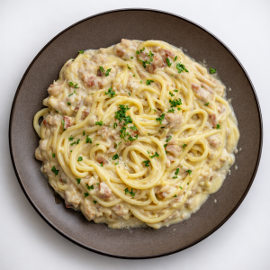 Spaghetti 'carbonara' roomsaus met kip en spek